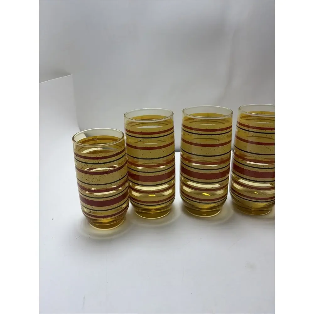 Mid Century Modern amber glass juice tumblers yellow red stripe speckled Anchor